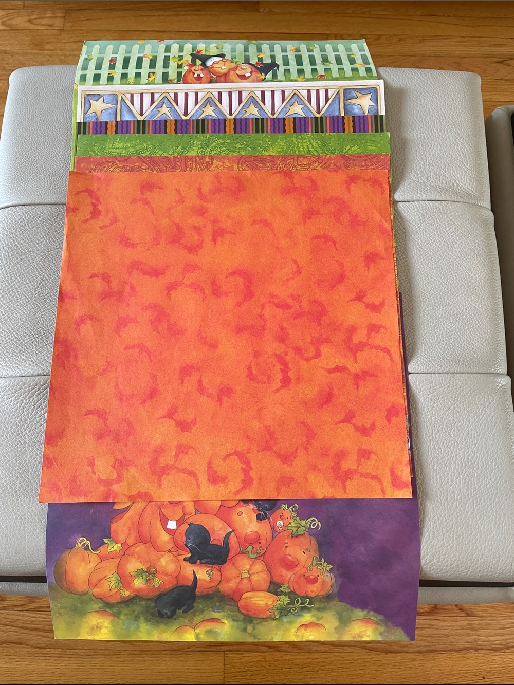 Decorative crafting paper. See photos for individual designs.